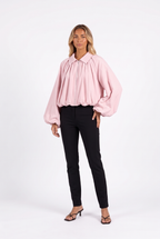 Pale pink balloon-sleeve zip jacket — three-quarter